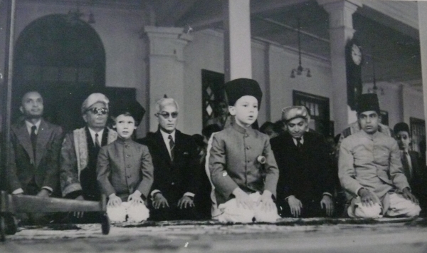 1900-2000-noorani-family-album-0292-prince-karim-reciting-namaz-nairobi-jk