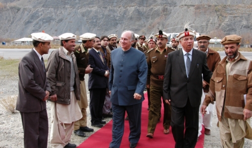 His Highness the Aga Khan welcomed upon arrival at Chitral airport. His Highness pledged to assist the population 2003-12-04