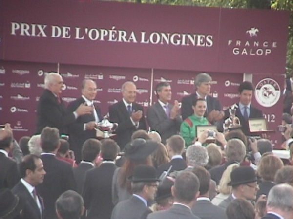 H.H. The Aga Khan on the winner's podium at Longchamp