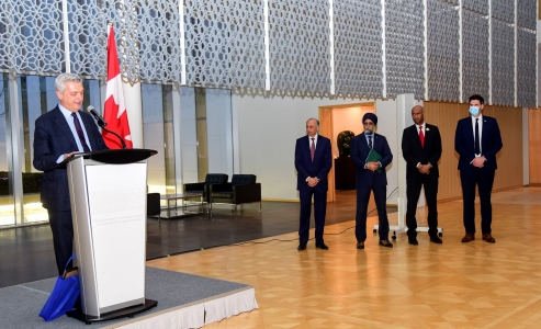 The U.N. High Commissioner for Refugees Filippo Grandi addressing Canadian Cabinet members anDr. Mahmoud Eboo