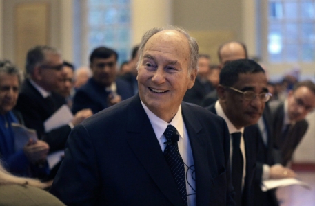 The Aga Khan, center, smiles as he arrives at the Memorial Church on the campus of Harvard University before addressing an audie