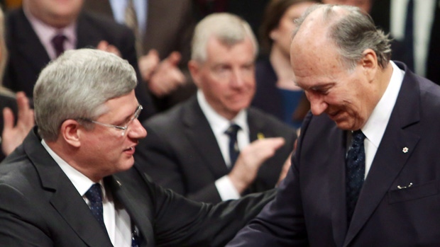 Prime Minister Stephen Harper, left, congratulates the Aga Khan after his address to Parliament in 2014. The spiritual leader's 