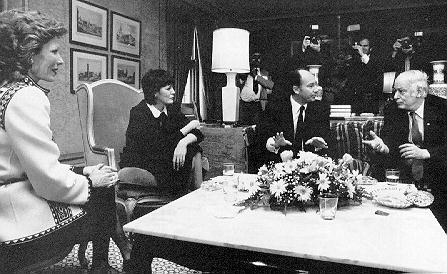 Mowlana Hazar Imam in a discussion with Premier Levesque while Begum Salimah and Mme. Corinne Cote-Levesque look on at a private