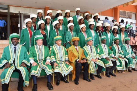 Excelled. Students from the Aga Khan University (standing) with the university officials (seated) led by the University Presiden