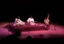 Afghan rubâb player Homayoun Sakhi (center) percussionist Salar Nader, and Chinese pipa player Wu Man, at the Aga Khan Music Ini