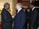 President Mwai Kibaki greets H.H.the Agha Khan during a State banquet hosted by President Museveni to mark the 50th anniversary 